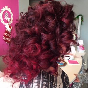 curly-red-hair glo extensions denver